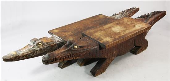 Papua New Guinea - near pair of crocodile-carved low tables